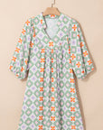 Reagan Floral Print 3/4 Sleeve Notched Neck Mini Dress