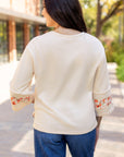 Flower Exposed Seam Wide Sleeve Top