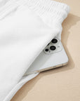 Plus Size Solid Raw Seam Top and Drawstring Pants Set