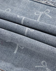 Denim Bow Light Wash Raw Hem Jacket