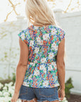 Indigo Floral Bow Applique Slit Sleeveless Peplum Blouse