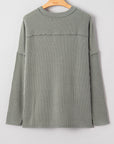 Solid Corded Knit Reverse Seam Long Sleeve Top