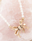 Gifted Freshwater White Pearl Golden Bow Pendant Necklace