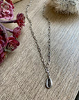 Shell pendant on paper clip chain choker