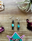 Green turquoise dangle earrings with brown shell