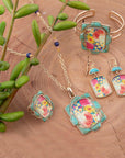 Scenic Floral and Blue Turquoise Golden Pendant Necklace