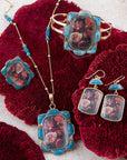 Scenic Red Florals Blue Apatite Golden Pendant Necklace