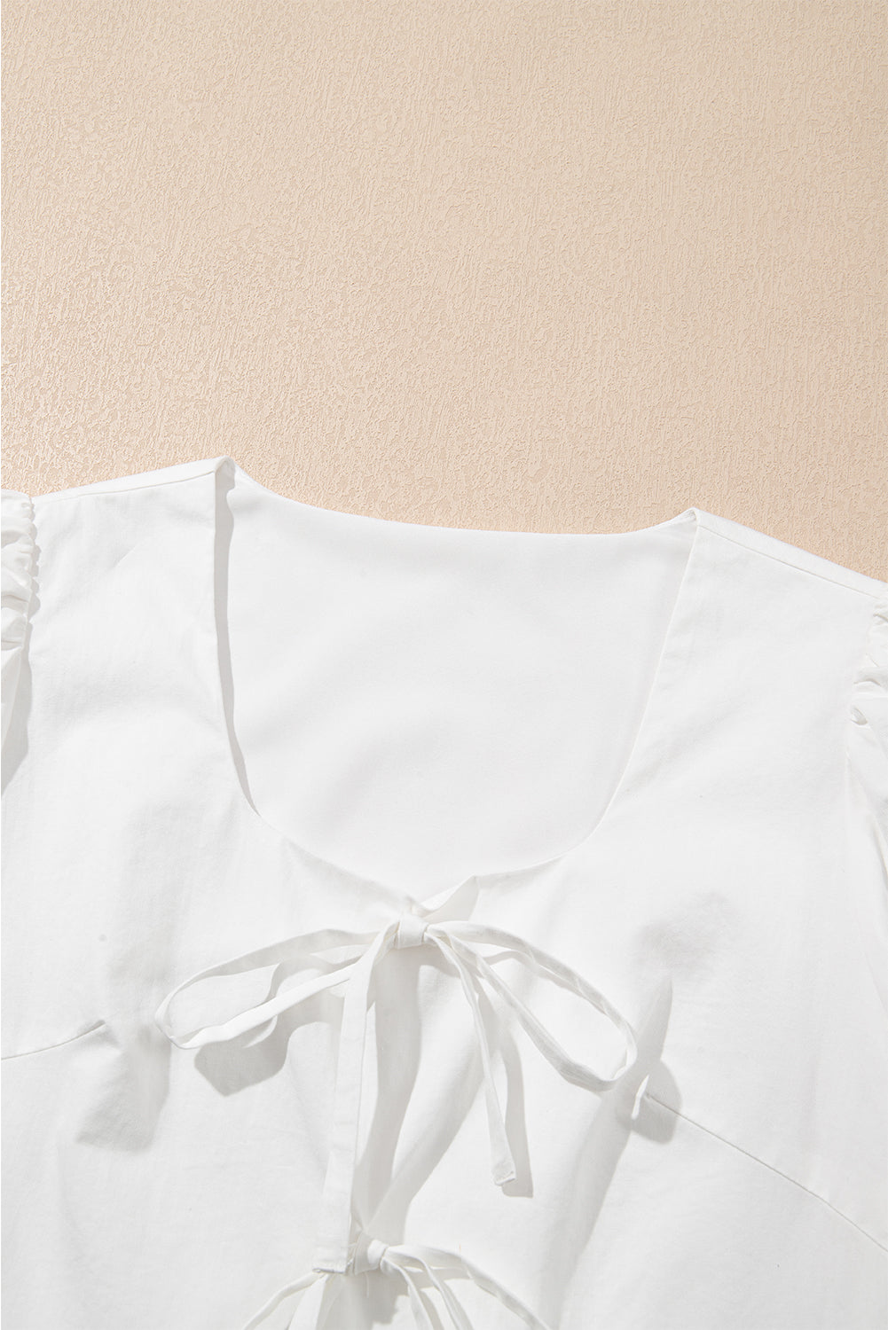 Bow Puff Sleeve Peplum Top