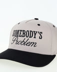Somebody's Problem Snapback Hat