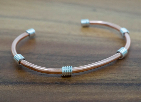 SIMPLE COPPER CUFF BRACELET W/ STERLING SILVER COILS