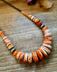 23 inch Graduated Orange Spiny Necklace with Sterling Silver Pearls