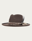 H0012 - BROWN COWGIRL HAT WITH FABRIC AND LEATHER HATBAND AND DUO COLORED FEATHER.