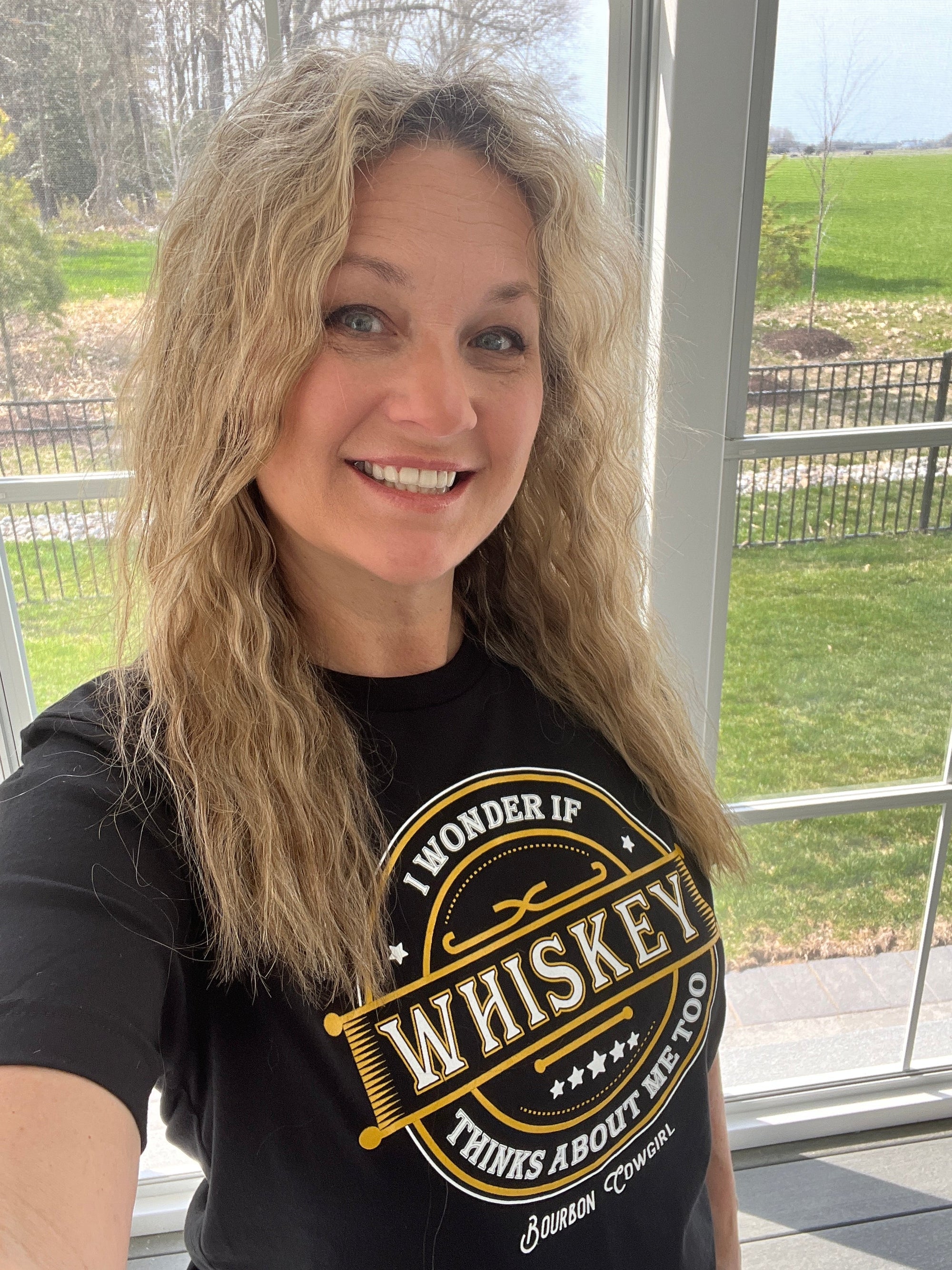 I Wonder if Whiskey Thinks About Me Too Graphic Tee - Bourbon Cowgirl