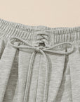 Solid Tied High-Waist Pleated Sweatpants
