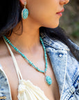 Carved Blue Turquoise and Sterling Silver Pendant