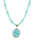 Carved Blue Turquoise and Sterling Silver Pendant
