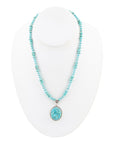Carved Blue Turquoise and Sterling Silver Pendant